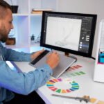 Lifestyle of designer using a 3d printer for graphic design