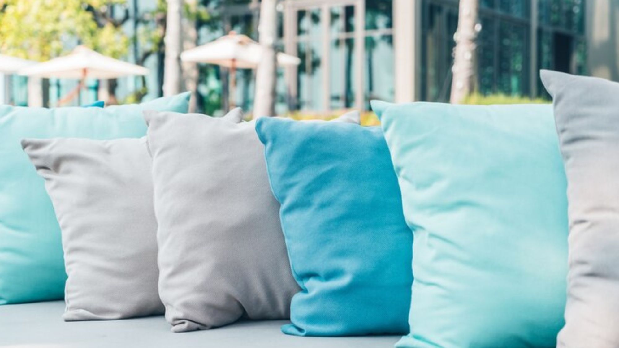 6 outdoor cushions in a row