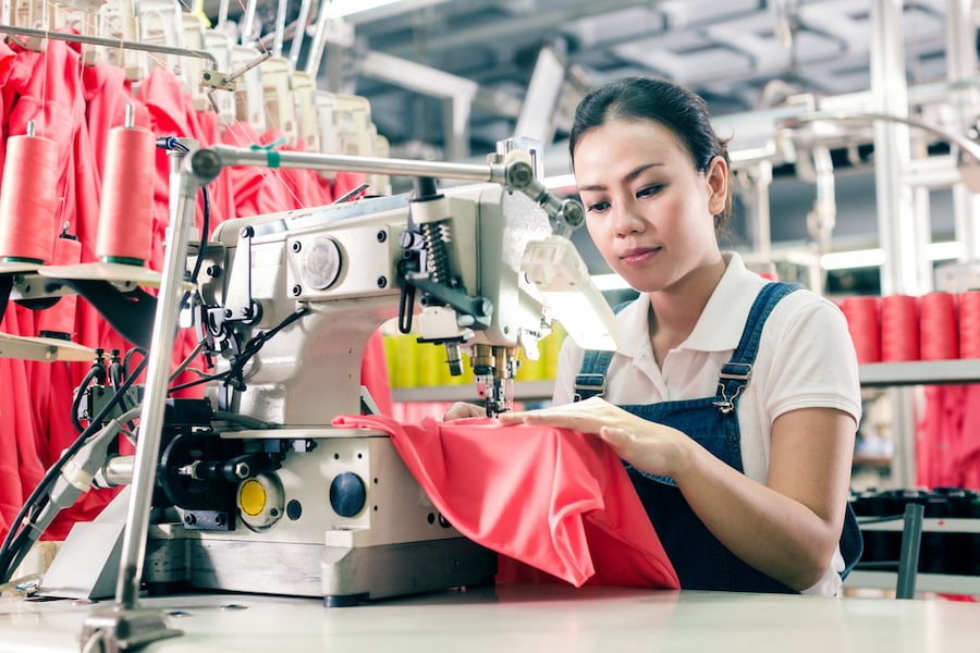 A girl is working in textile